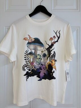 Hot Topic Cream Tee with Colorful Mushroom Creature Print
